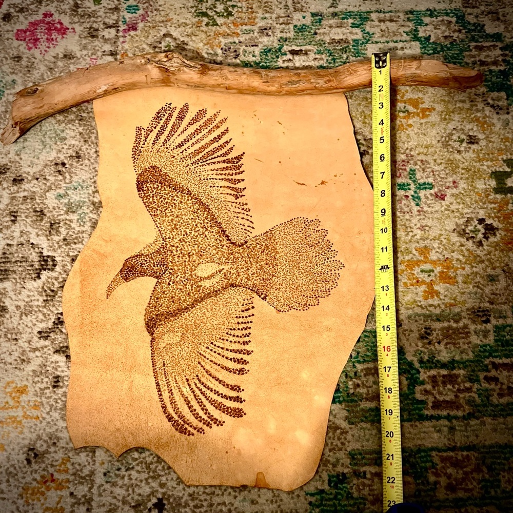 Handcrafted Leather Art with Crow Design
